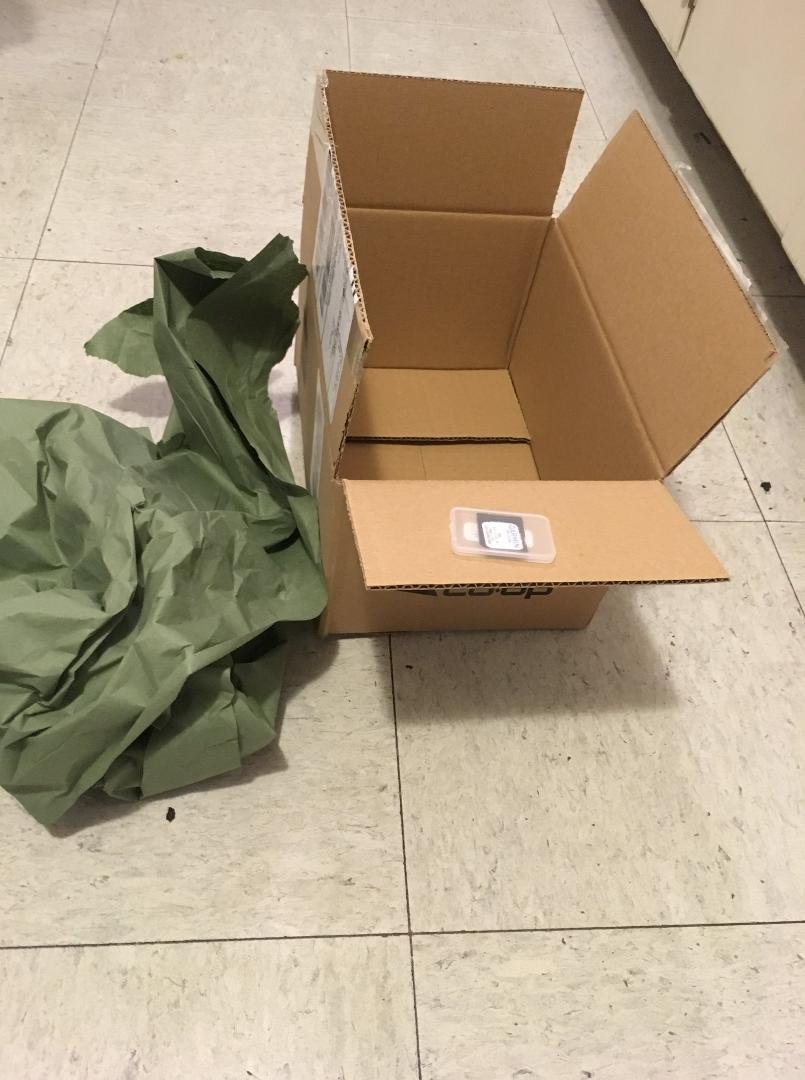 My local REI didn't have the map chip for my GPS, so I ordered it to be sent to my house. Here's the box it came in and the paper that came in the box. The chip itself is that little rectangle. Seems to me they coulda pu