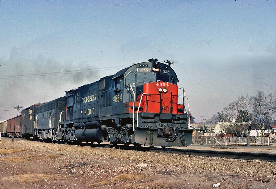 SP ALCO C628 #4854 Leaving  San Jose passing near Auzerais St. in February 1966.