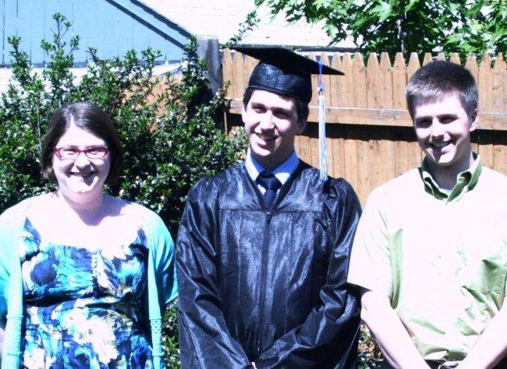Dan on his UNH graduation day 2009 with his brother Paul-John with Paul's wife Liz