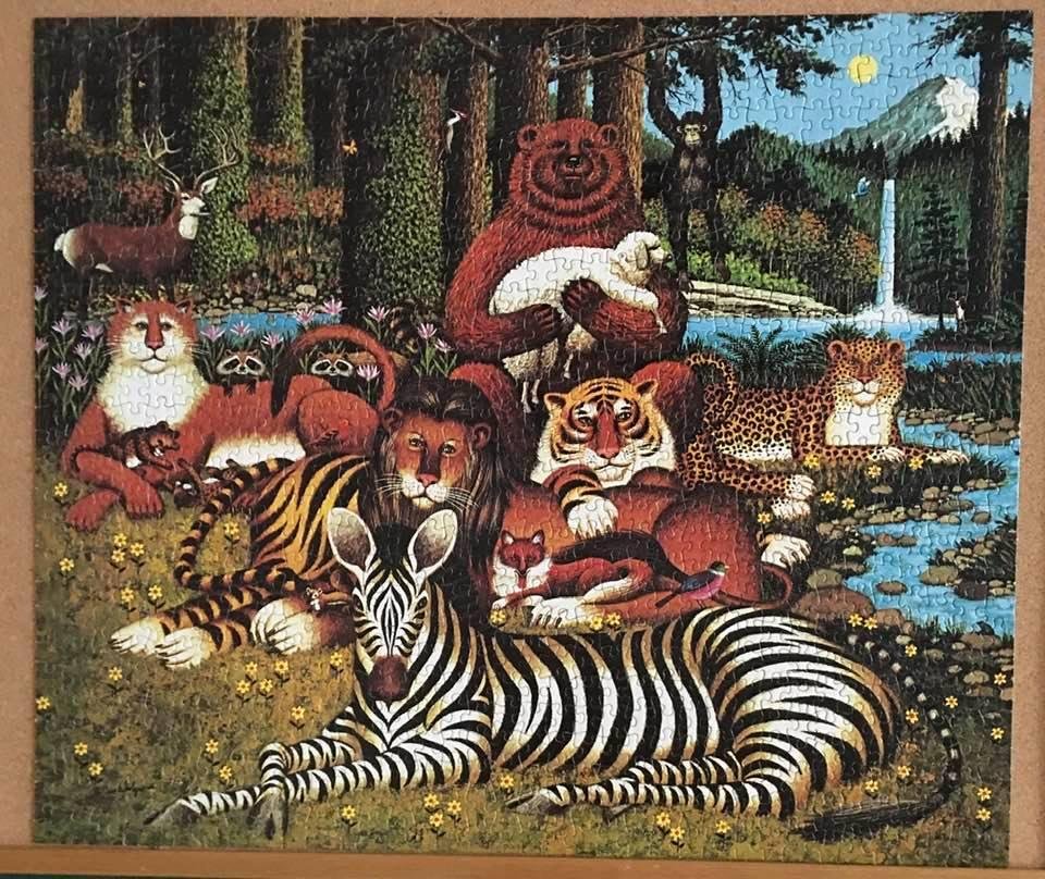 1000 pieces MB Milton Bradley Company jigsaw puzzle, Charles Wysocki,s Americana. Took me longer then usual to finish but fun non the less.
