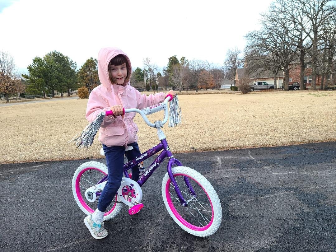 Ariel enjoying her new bicycle