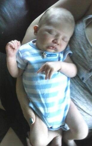 Spent two hours just chillin with Coty yesterday. Perks of being Grandma! What a sweet little boy. Some day I'll get a pic with his eyes open:)