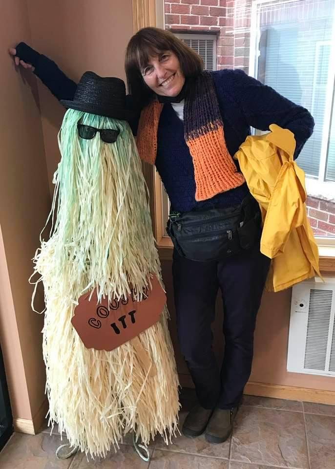 We are in Prior Lake Minnesota. Renee standing next to a scarecrow that we call “Cousin Itt“
(also, she is sporting the latest haircut that I gave her…)