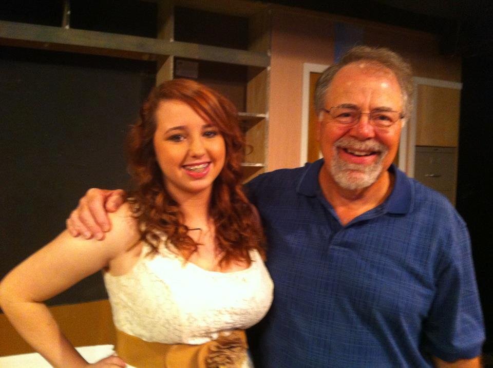 My granddaughter Ashlyn was nice enough to have her picture taken with me when she received an award for a play she wrote.