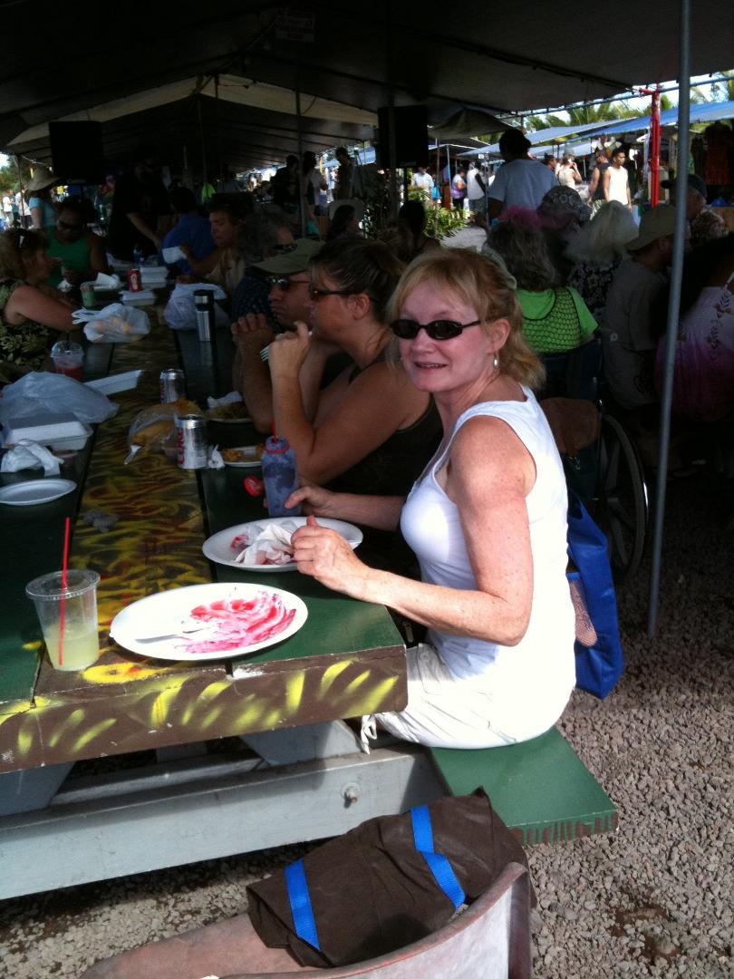 Coleen enjoying Sunday breakfast at the Maku'u farmers market.