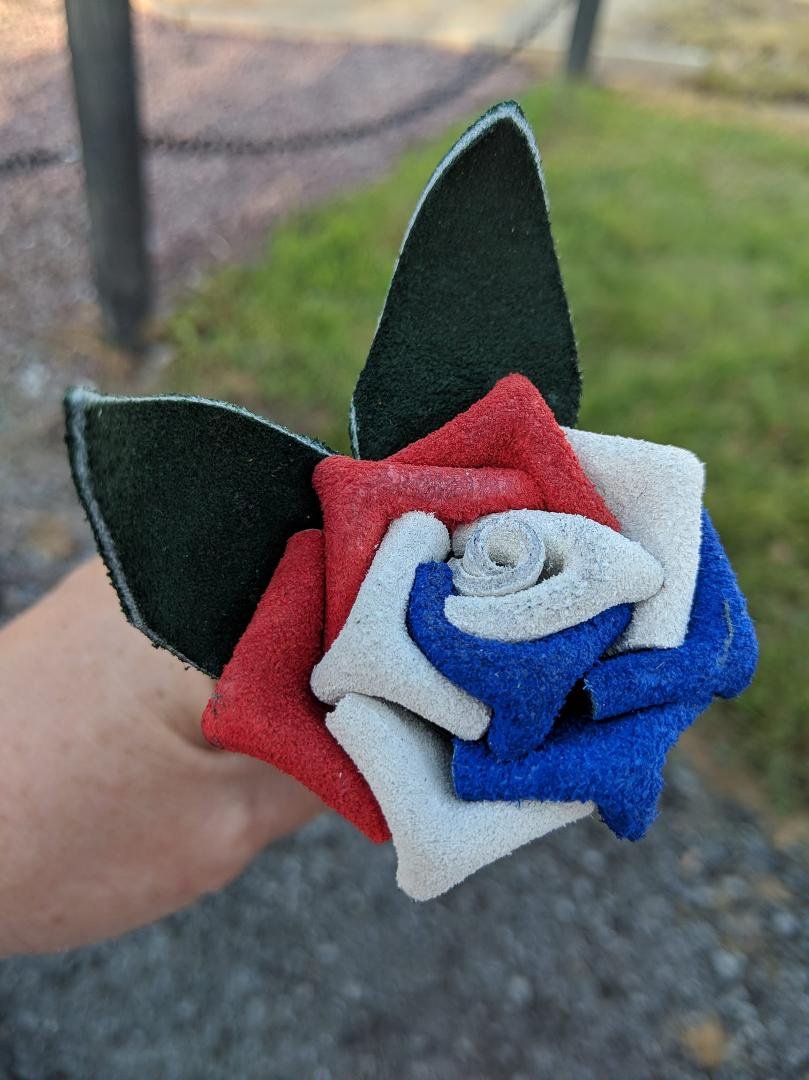 Hand made leather Rose. My husband bought for me at the Renaissance Fairetoday