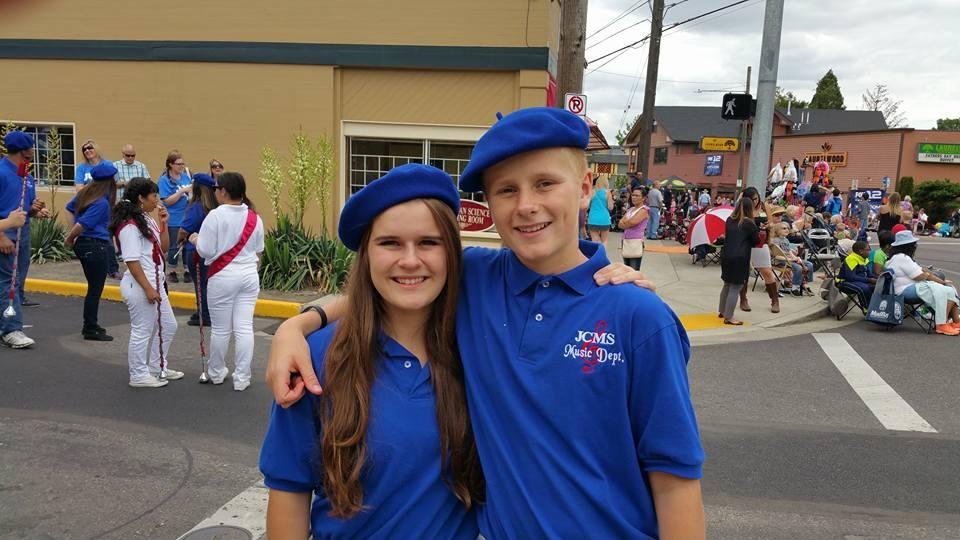 Niece and nephew marching at the Junior Rose Parade.  What fun!