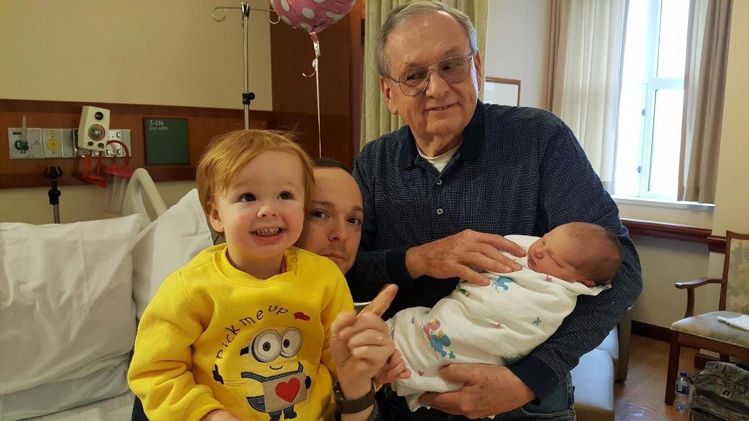 Meredith Heffner Napier with the male members of her family, Grandfather, Father and Big Brother, Nate.