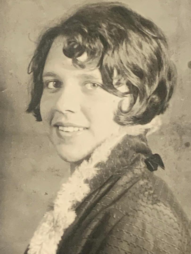 We are at a family gathering this weekend, brought along an old shoe box with photos from the thirties and forties for my mom to identify. This photo is my mom’s mother, probably a high school picture. Opal is my only gran