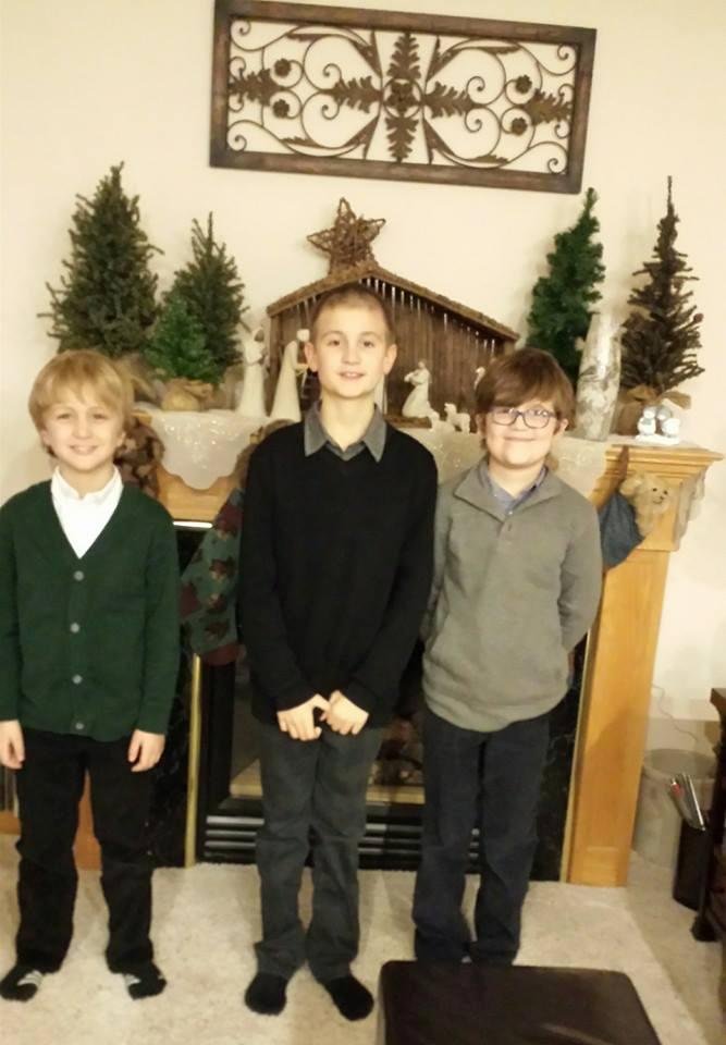 Nolan,:Ashton, and Jaden at grandma Sue ' s house on Christmas Eve.