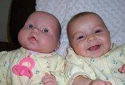 My beautiful granddaughter & her doll <3