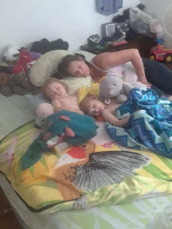Erin sleeping with the boys and I don't think she knew Eddie was taking this picture of them. Love you guys!