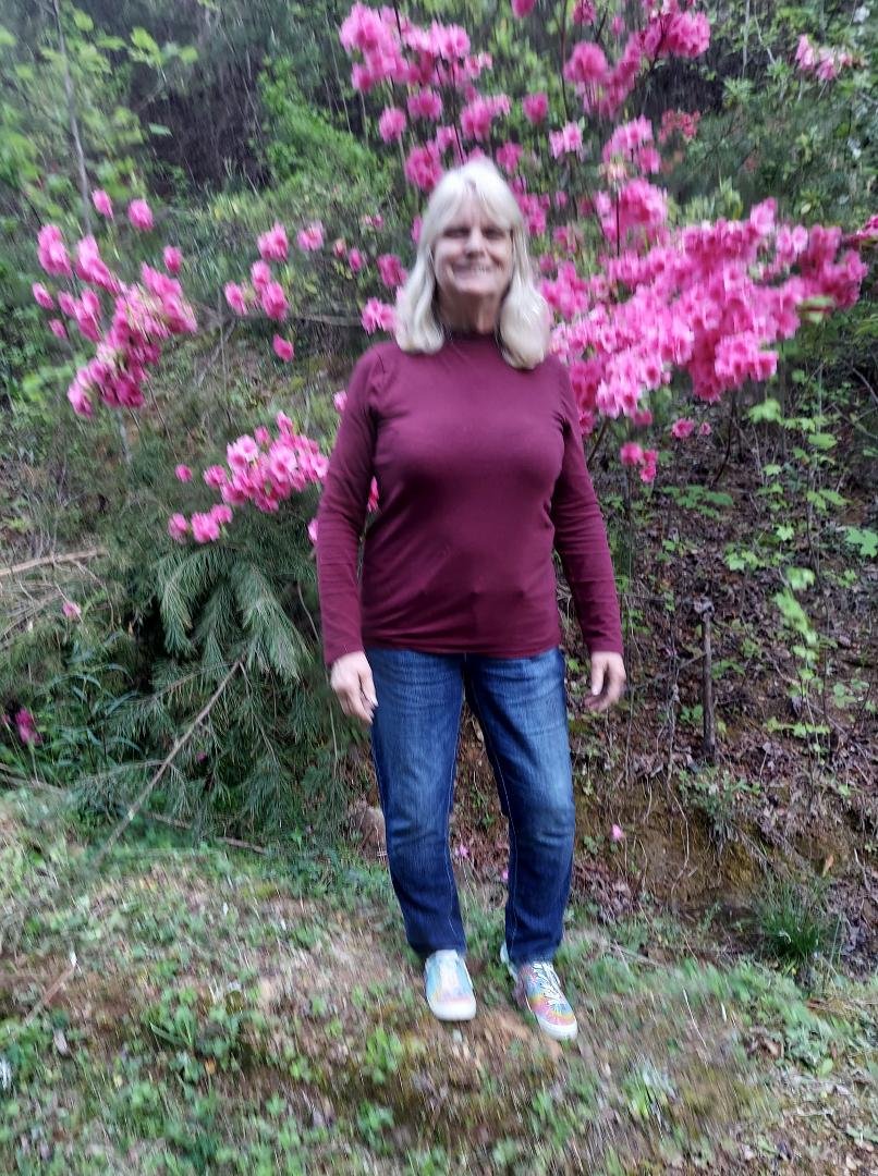 Ruth with one of the azaleas  It has grown into a tree!