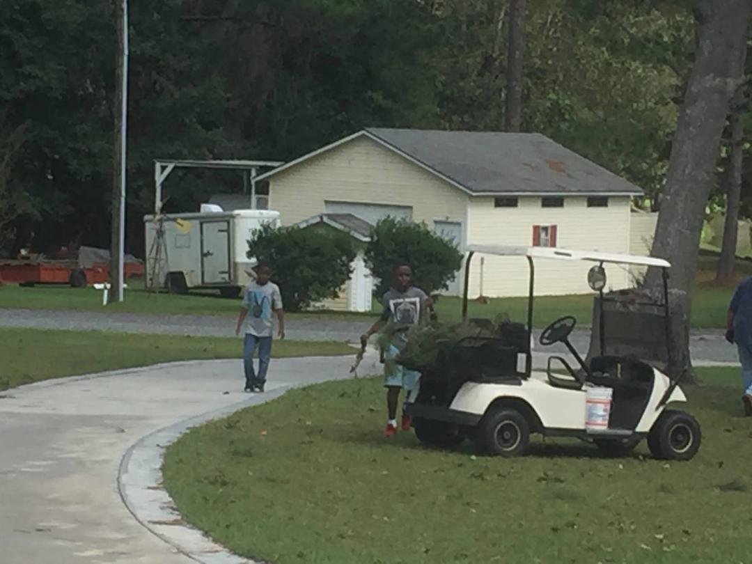Helping with the clean up.
