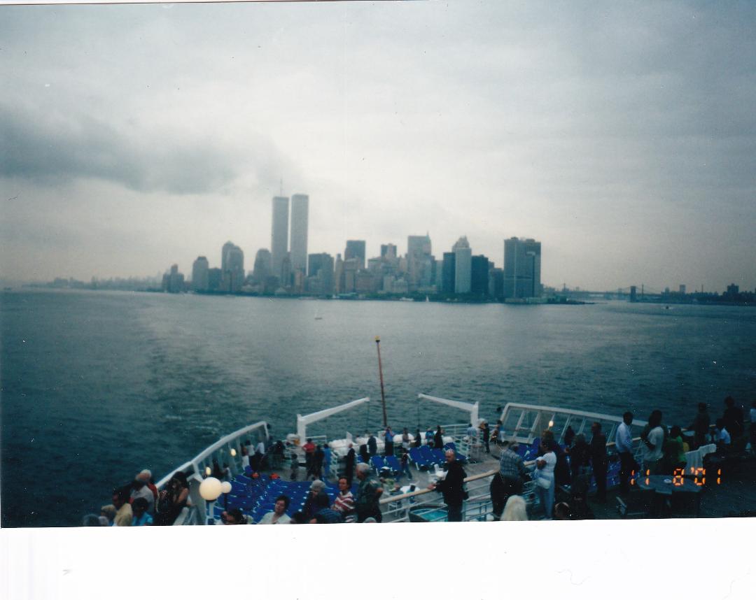 Lower Manhattan on August 11, 2001. Note how the clouds make the WTC towers look like smokestacks. ominous. Taken from the stern of the RNS QE2 on its way to England. Picture were not developed until about a week before