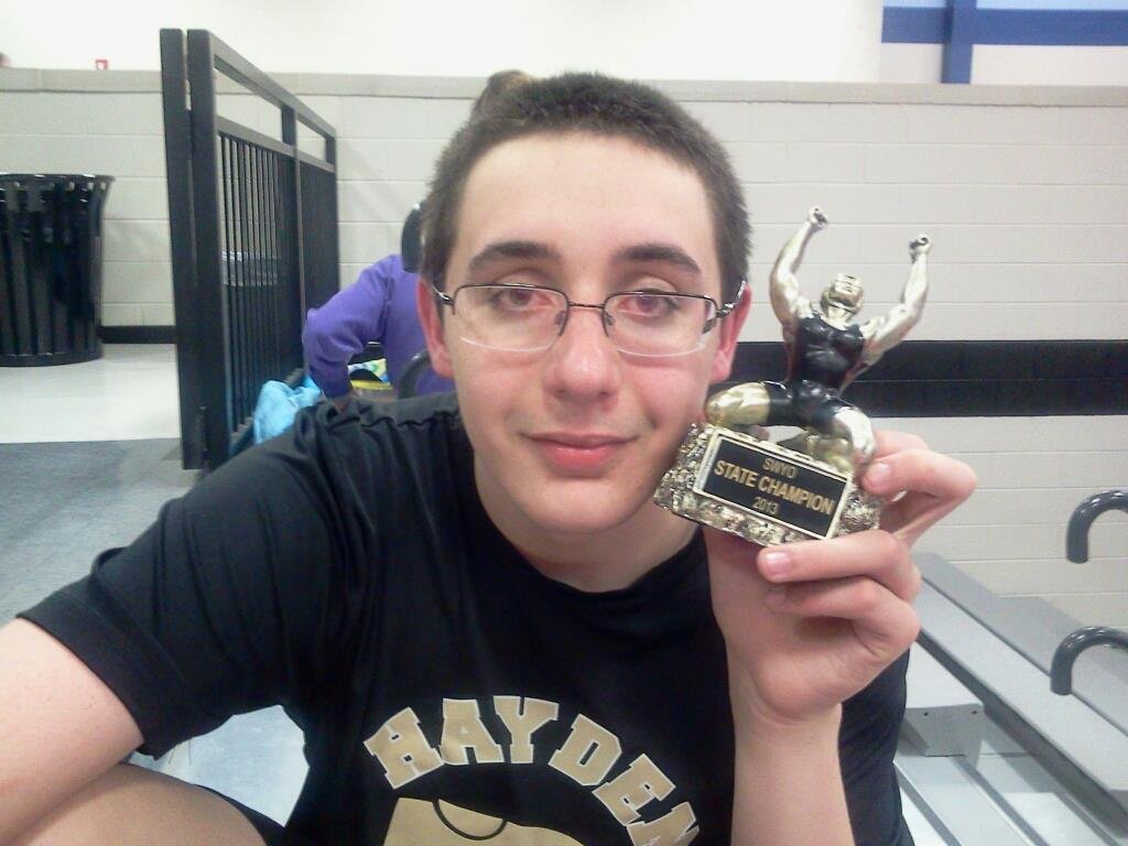 My little boy got SYWO state champion in the 265 pound weight class. He only weighs 212 pounds. I am so very proud.