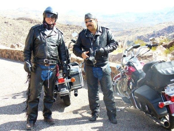 My 1rst harley .. back yard in Big Bend.. Do these leathers make me look FAT?