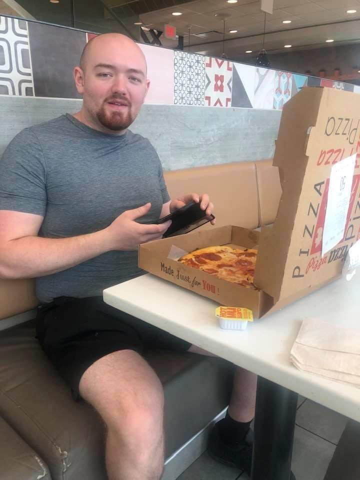 Hunter enjoying his pizza at McDonald’s!