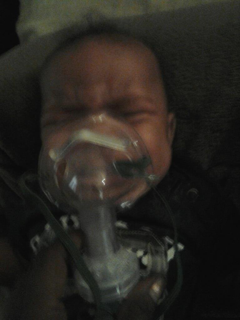 Elija HATES,  and I mean HATES, breathing treatments !!
#kickingscreamingscratchingtears! Pissed off!