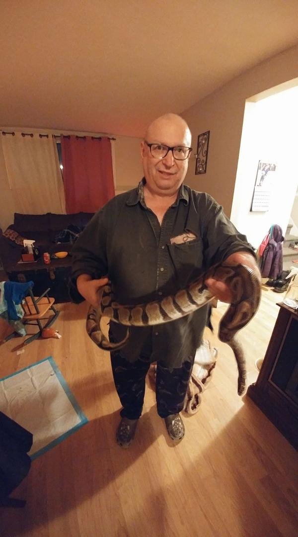 Here im holding my sons 5 foot python lol