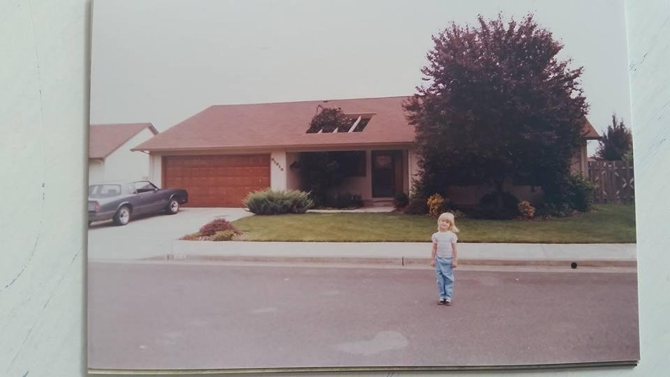 Laura getting picture on our house appraisal with 84 SS.