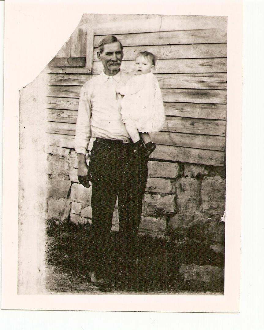 Hey, Gail Lucy, that's your Mom that Gr. Grandpa Cummings is holding. This was taken at Elvins, Mo.