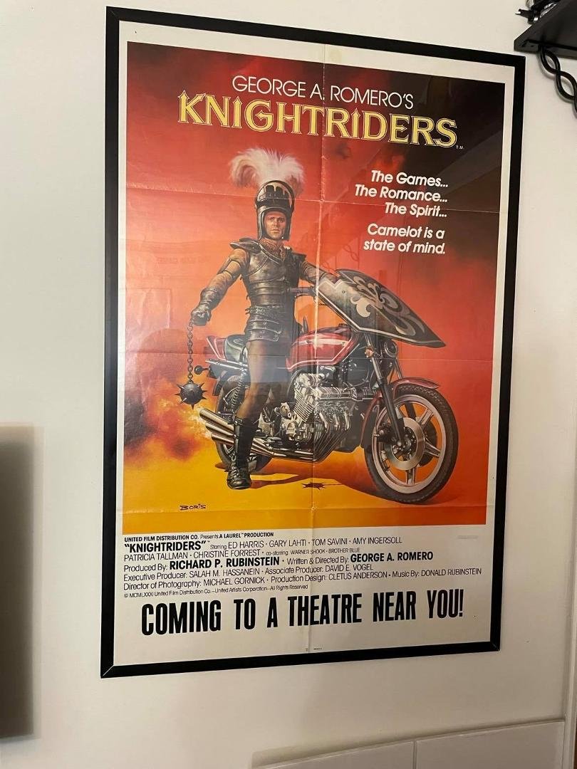 As some of you may know, I'm a fan of George Romero's work in general and his movie Knightriders, specifically.  I've had the regular movie poster on the wall of my study for quite some time but, my favorite poster of the m