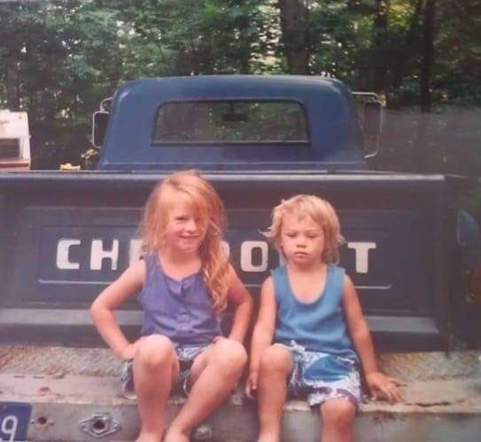 One of my favorite photos of the kids! In the back of Bob's pick-up on the property in Norvel. Moms house wasn't built then as you can see the camper in the picture!!