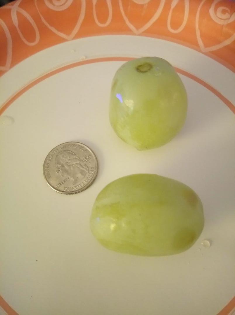 Look carefully those are grapes and that's a quarter! Crazy
