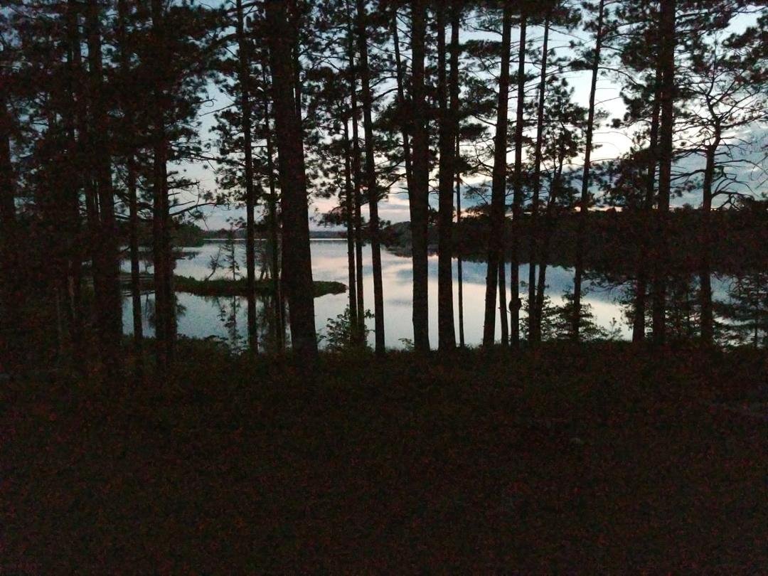 10 p.m. last night at the lake. Sun is down but light and clouds reflected on the glassy lake.