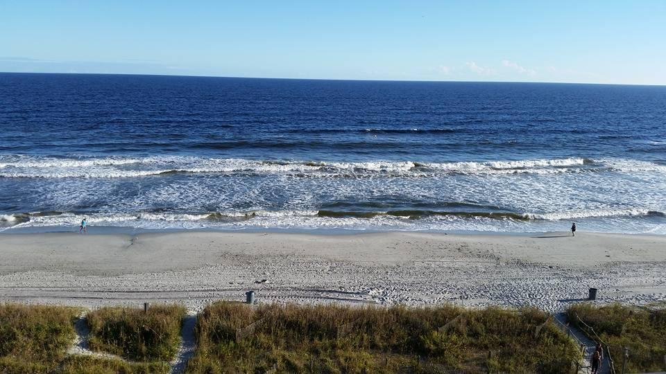 Me and Karen on 7th floor balcony at Myrtle Beech for 4 days beautiful weather