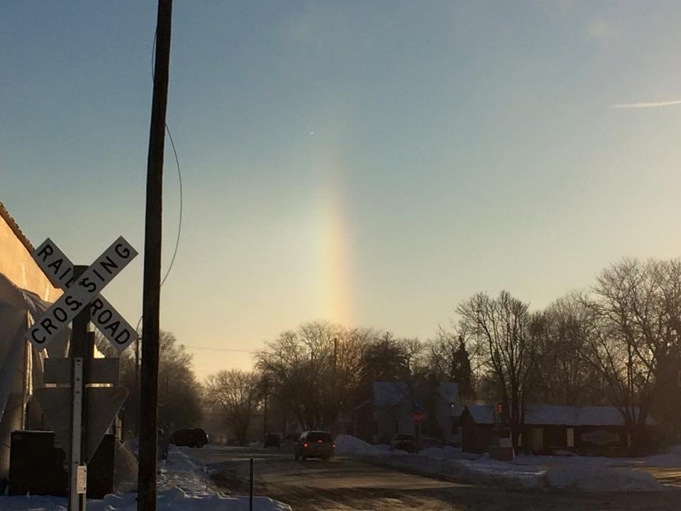 Took this picture this morning. Looks like a vertical rainbow