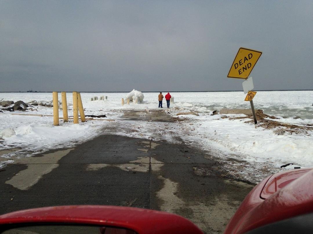 Took a little ride to the end of the road to Iron Pier Beach in Jamesport. The pier is encased with ice and the Long Island Sound is frozen as the the Great Peconic Bay and the Peconic River. So much for global warming, A