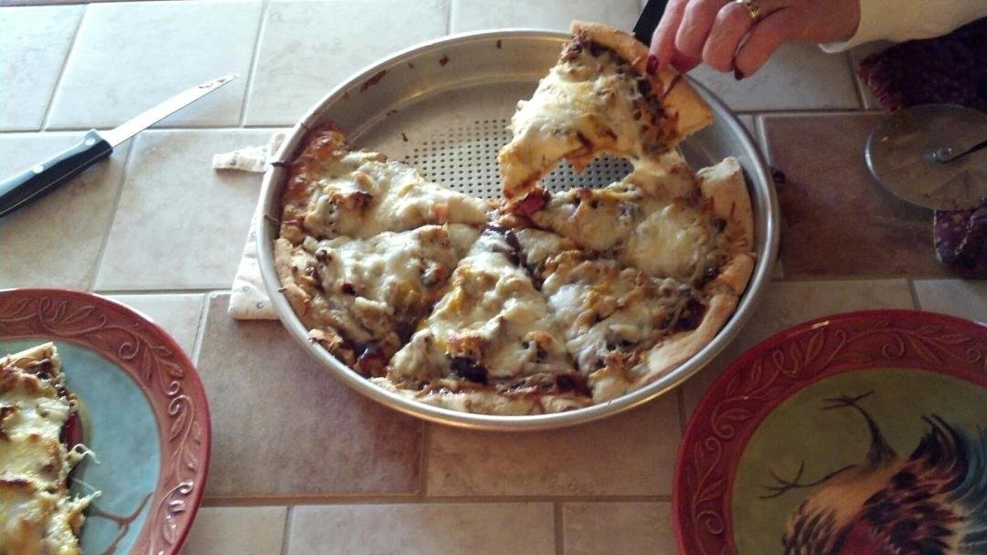 Yesterday I smoked a shoulder for our family Easter dinner.   Today, Lisa Hamilton Crawford turned it into a BBQ pizza...both mmmmm good!