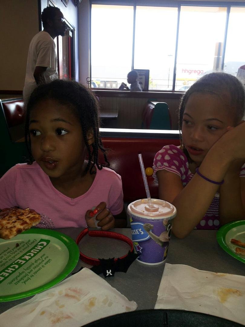 In the place i hate most on earth. i hate cheesy mices to pieces. With my 2 favorite sisters, Nyla & Laela.