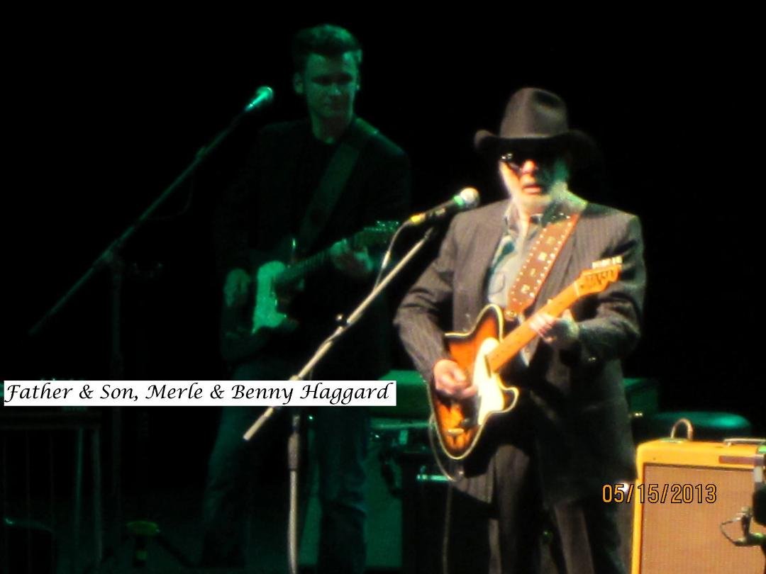Merle with his youngest son, Ben, playing lead guitar with the Strangers.