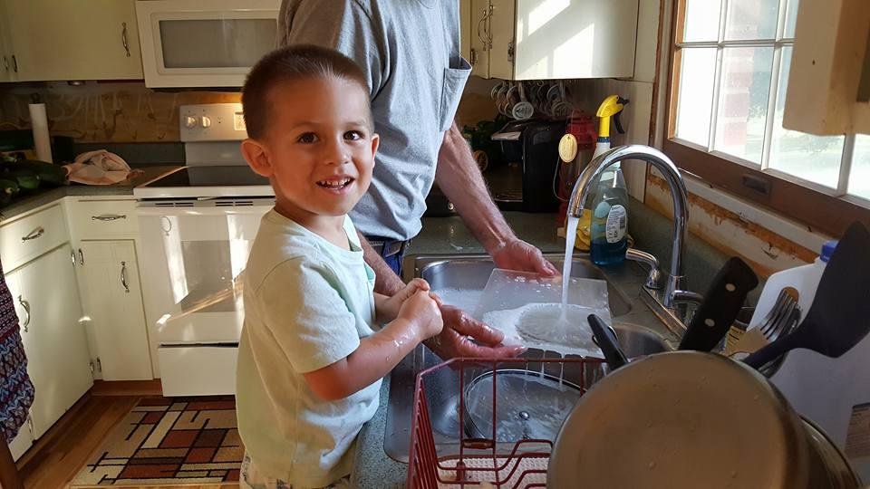 lincoln helping chuck with the dishes
......
