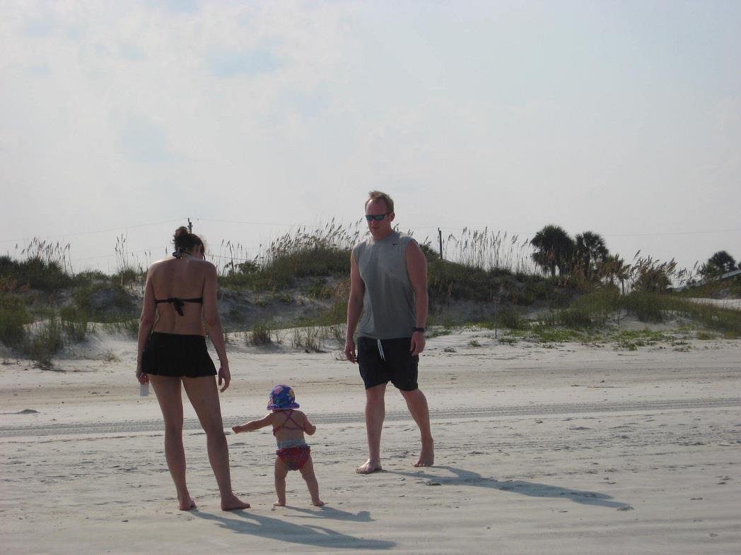 Footprints in the sand. Natalie, Lane, & Scott
