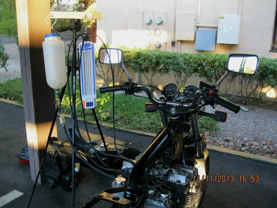 My carb sync setup in my apt parking lot! :-) Another road bike I got running like a Swiss Watch! :-)
