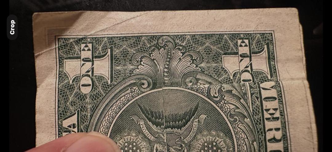 After piecing the puzzle I found a Demonic face of the US Dollar Bill.