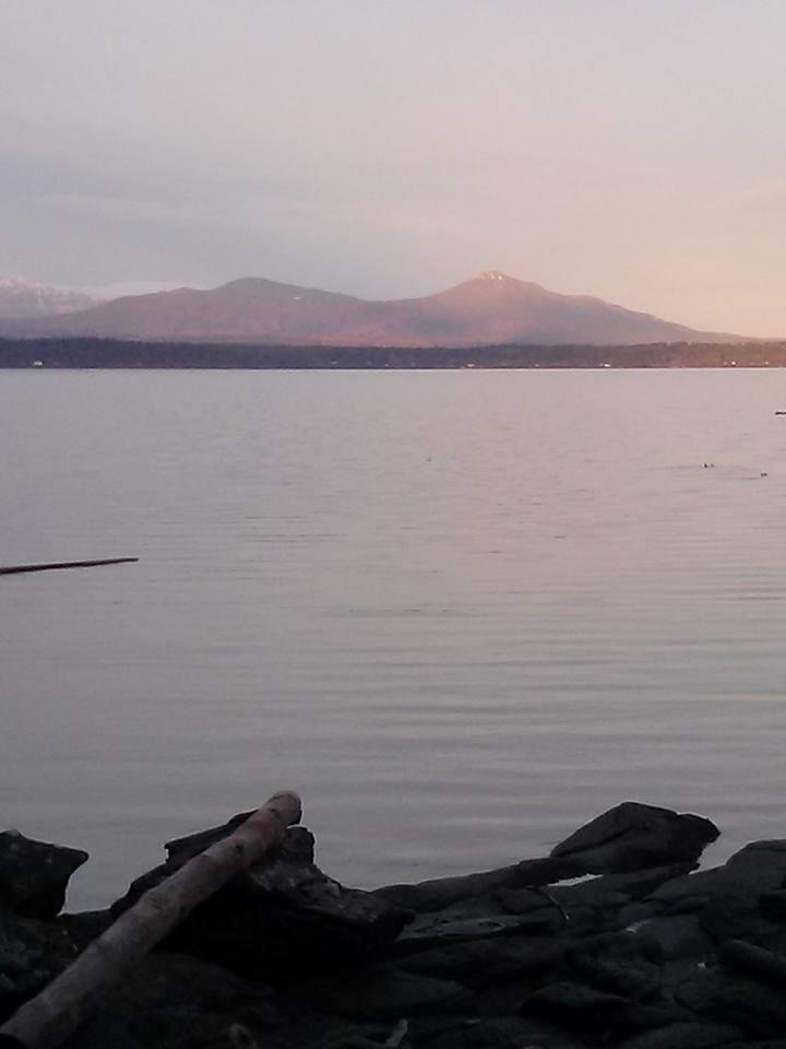 There is a bit of snow on them hills.