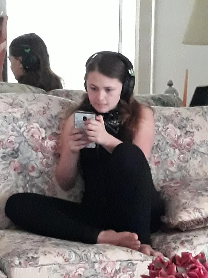 Anna, doing what teenagers do.