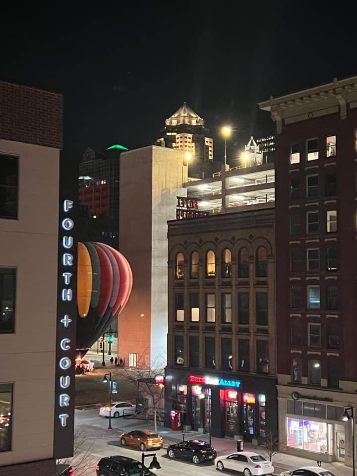 Hot air balloons in the city,  great capture from Thano Karaboitis , shared with permission.