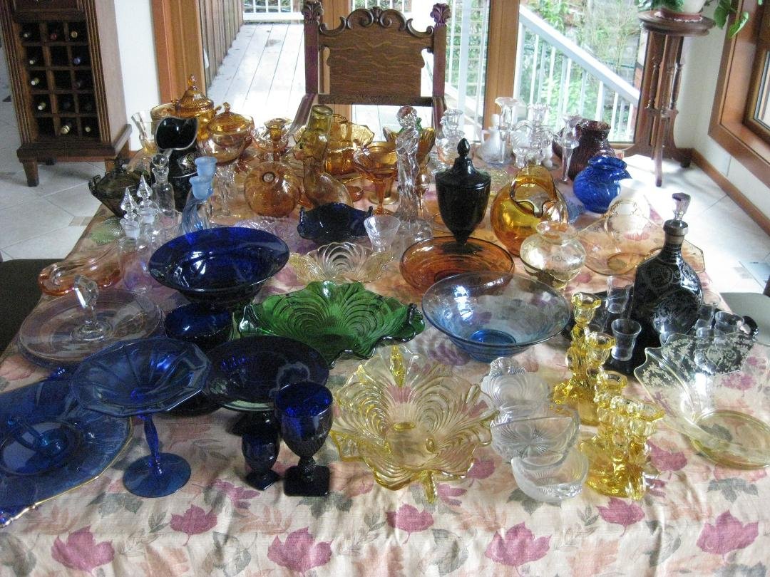 Clearing out the antique glass cabinets as we are downsizing--this is just one of many tables of glass we have packed up! Wow, didn't realize how full the cabinets were.