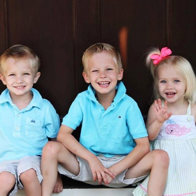 My grand kids in front of their (it kills me to say this) new house in Virginia. Too far away!