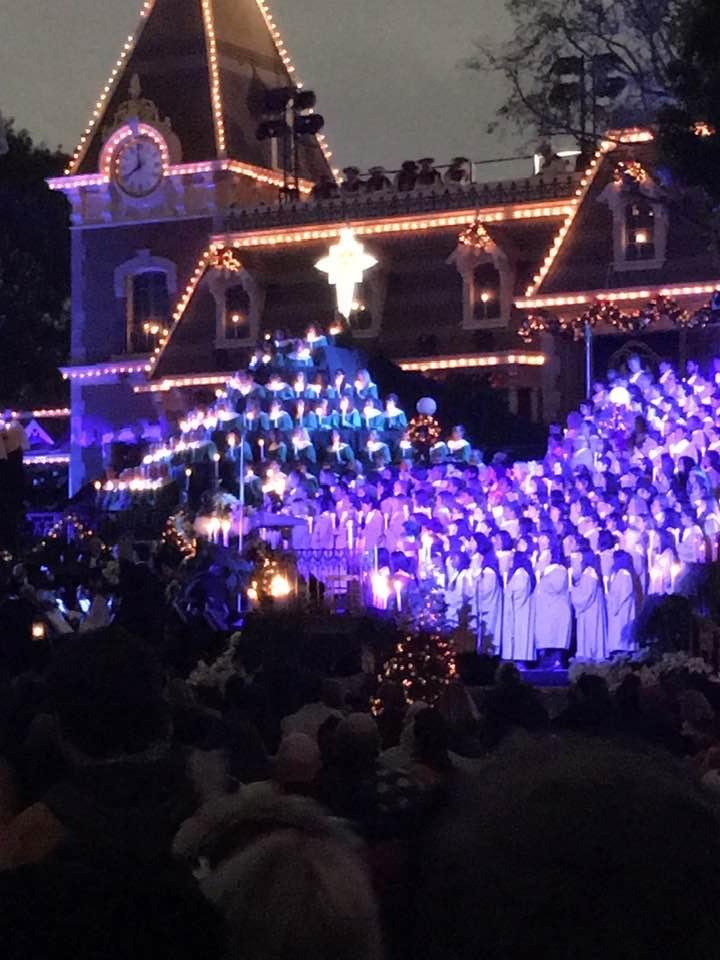 Cindy and Courtny are in the choir singing at Disneyland!