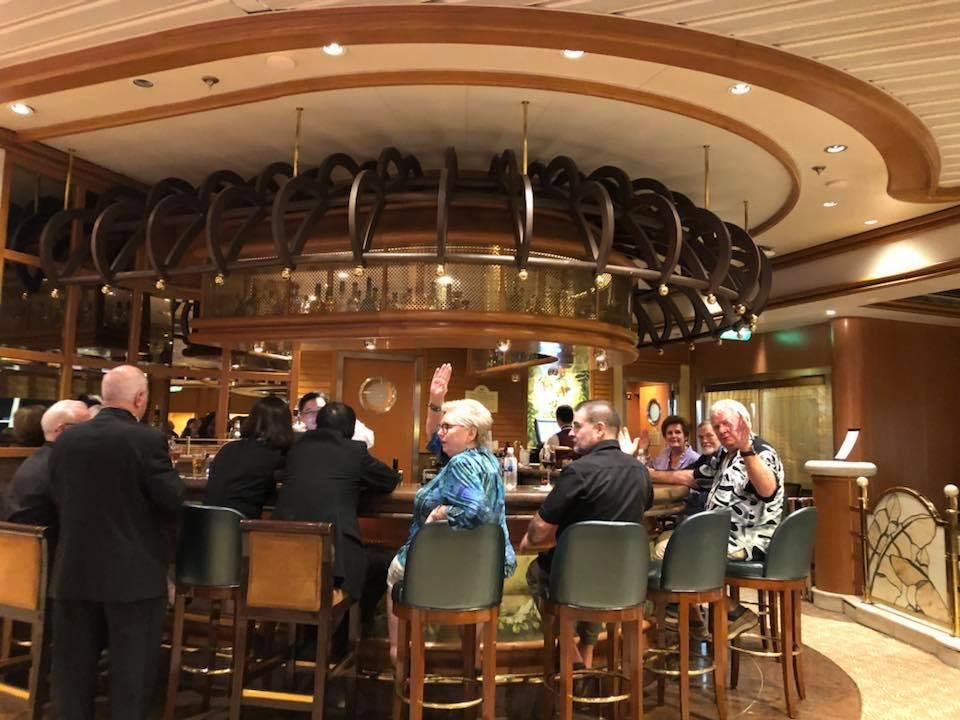 Dinner with Reed Royo, our favorite bartender onboard! Plus balloon drop party in the Piazza.