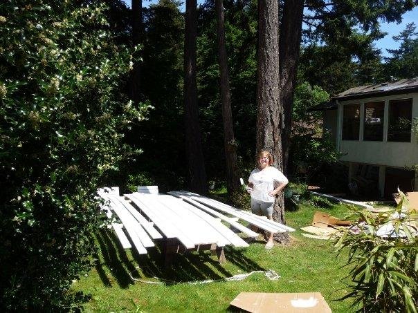 Georgia at work painting trim