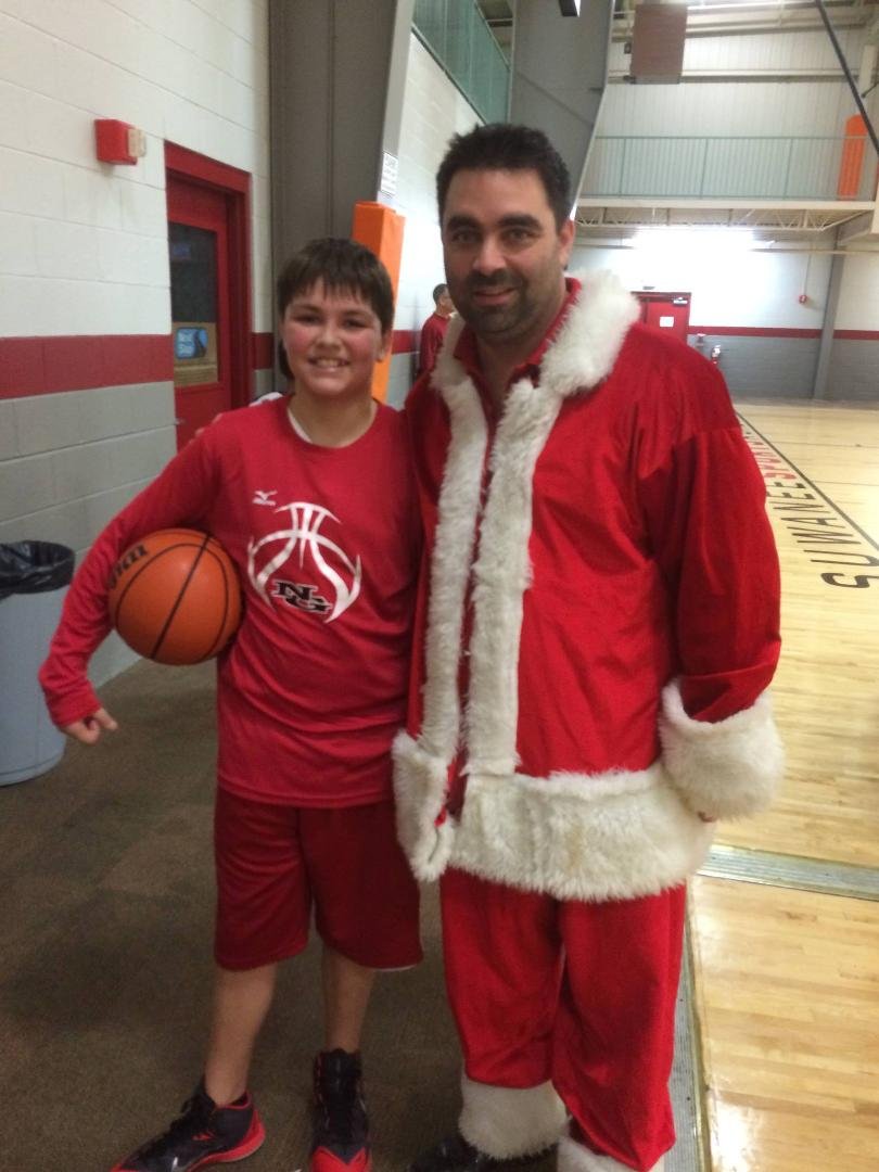 Joshua and his coach. No wonder magical things happen during his game.