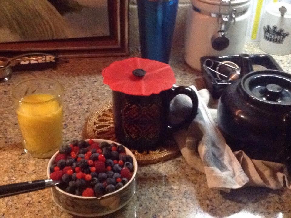 Breakfast with homegrown huckleberries and raspberries on top of yogurt,granola and blueberries. OJ and a pot of Scottish breakfast and lapsing douching tea to wash it down. I may be getting carried away!